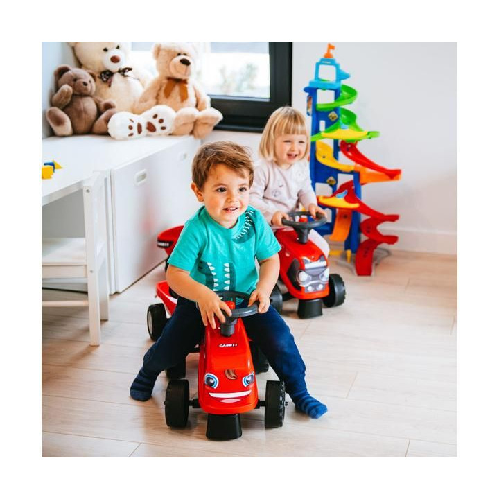 FALK - Dětské odrážedlo Baby Case IH s vlečkou, lopatkou a hrabičkami