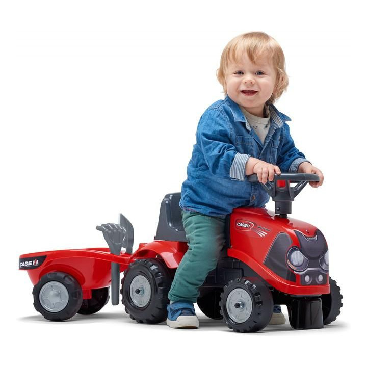 FALK - Dětské odrážedlo Baby Case IH s vlečkou, lopatkou a hrabičkami