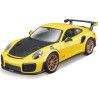 Kovový model auta 1:24 Maisto 39523  Kit Porsche 911 GT2 RS nejen pro sběratele.  Model je v detailním provedení a má otevíratelné dveře. Model je ve verzi Kit určené k sestavení. Barva modelu je žlutá a je přibližně 17 cm velký.