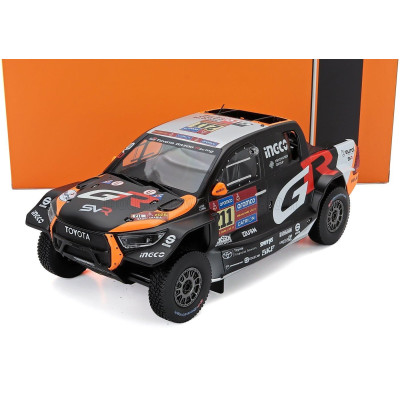 IXO MODELS TOYOTA GR DKR HILUX TEAM TOYOTA GAZOO RACING N 211 RALLY DAKAR 2025 HENK LATEGAN - BRETT CUMMINGS - BLACK ORANGE RED 