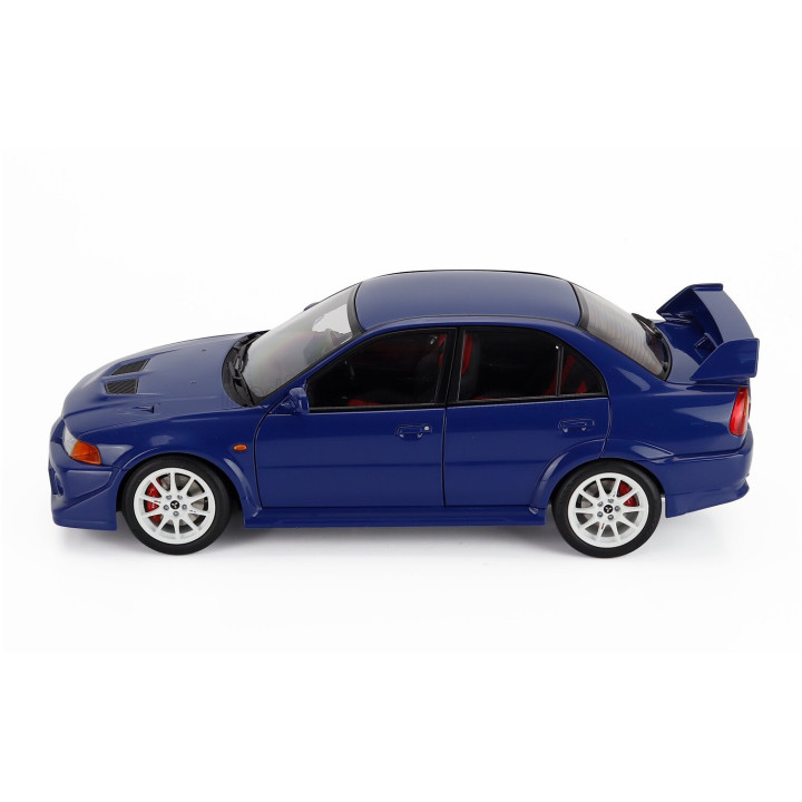 MOTORHELIX MITSUBISHI LANCER EVO VI GSR T.M.E. TOMMY MAKINEN EDITION 2000 - BLUE MET 1/18