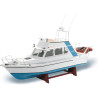 Stavebnice RC modelu lodi od firmy Krick,  Motorová jachta Lisa. Model je určen pro začátečínající lodní modeláře. Obsahuje plastový trup, dřevěné díly paluby a interiéru, motor Speed 400, lodní šroub s hřídelí, kormidlo, volant, vlajku, maketové díly a drobné příslušenství.